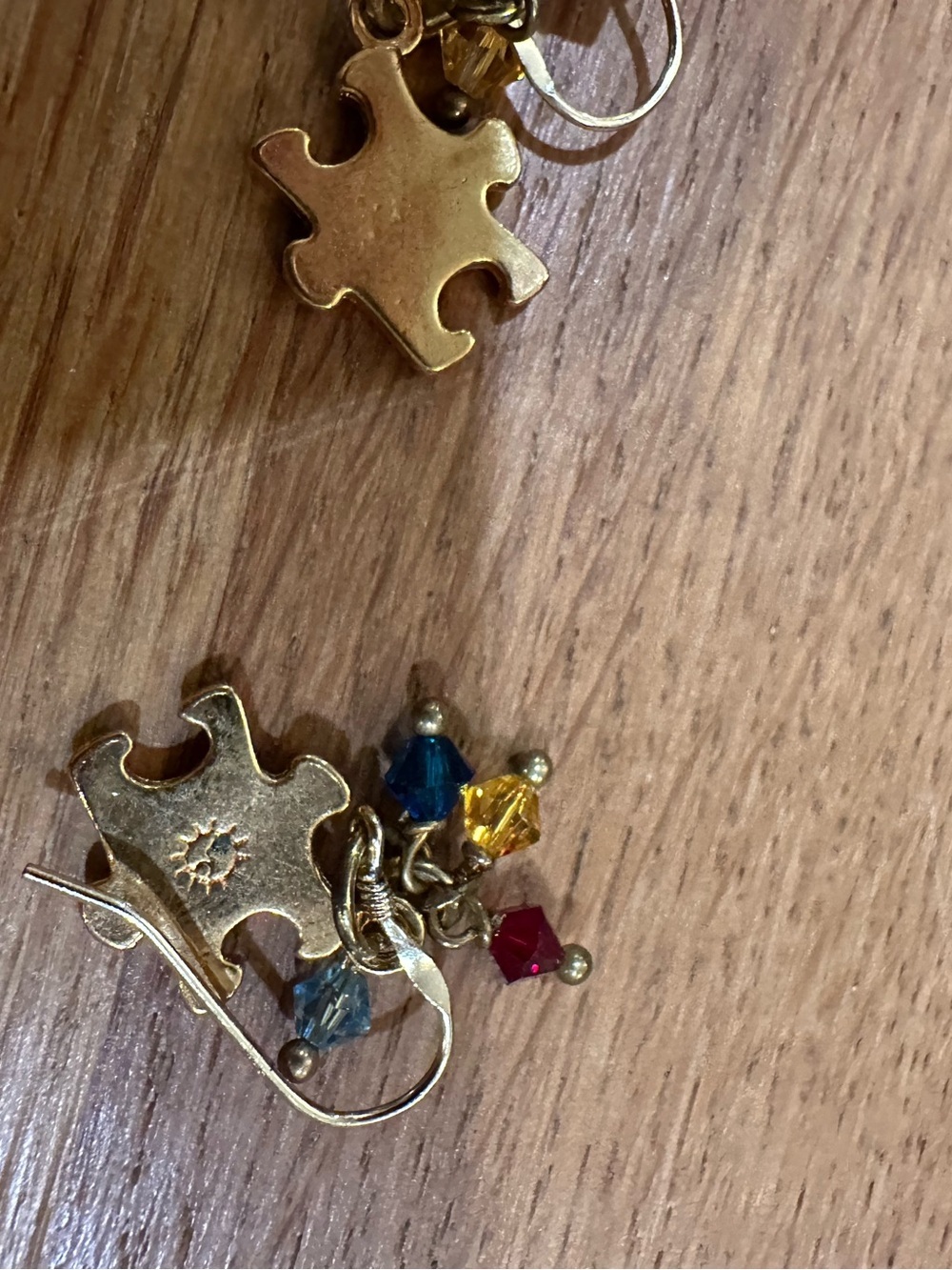 Gold Puzzle Piece Earrings with Blue, Yellow & Red Crystal Drops
